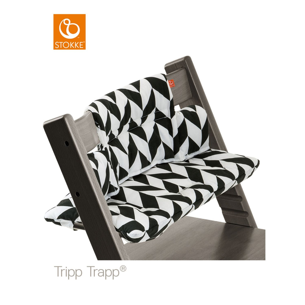 Stokke Tripp Trapp high chair featuring a black and white geometric patterned cushion set. 
